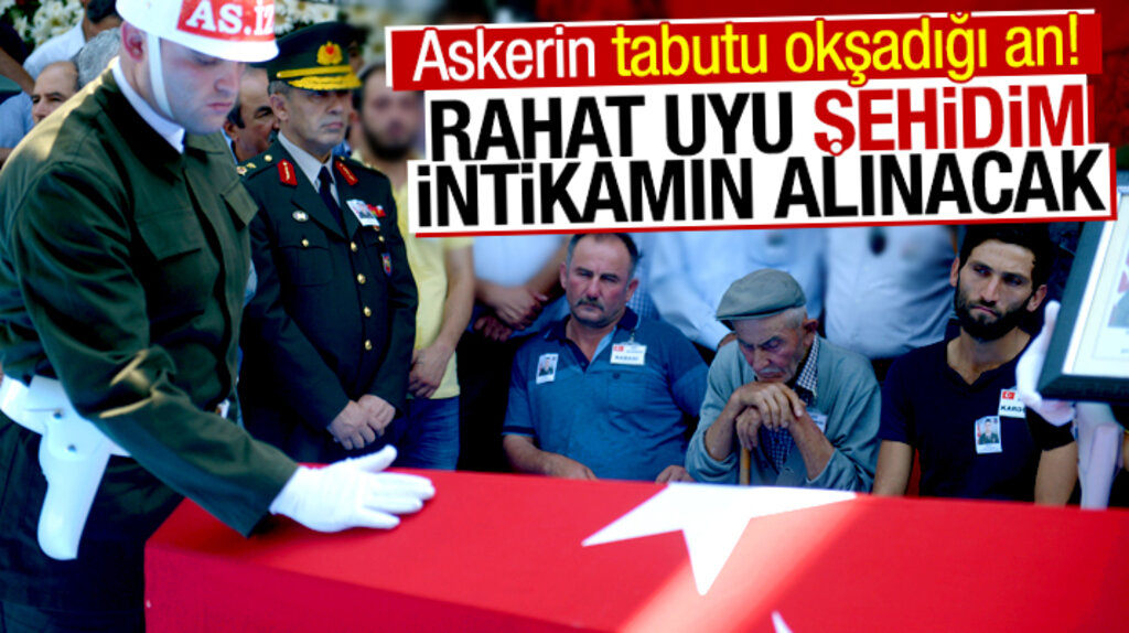 Samsun Bafralı şehit Şahan Sezer'in tabutunu okşayan asker boğazları düğümledi